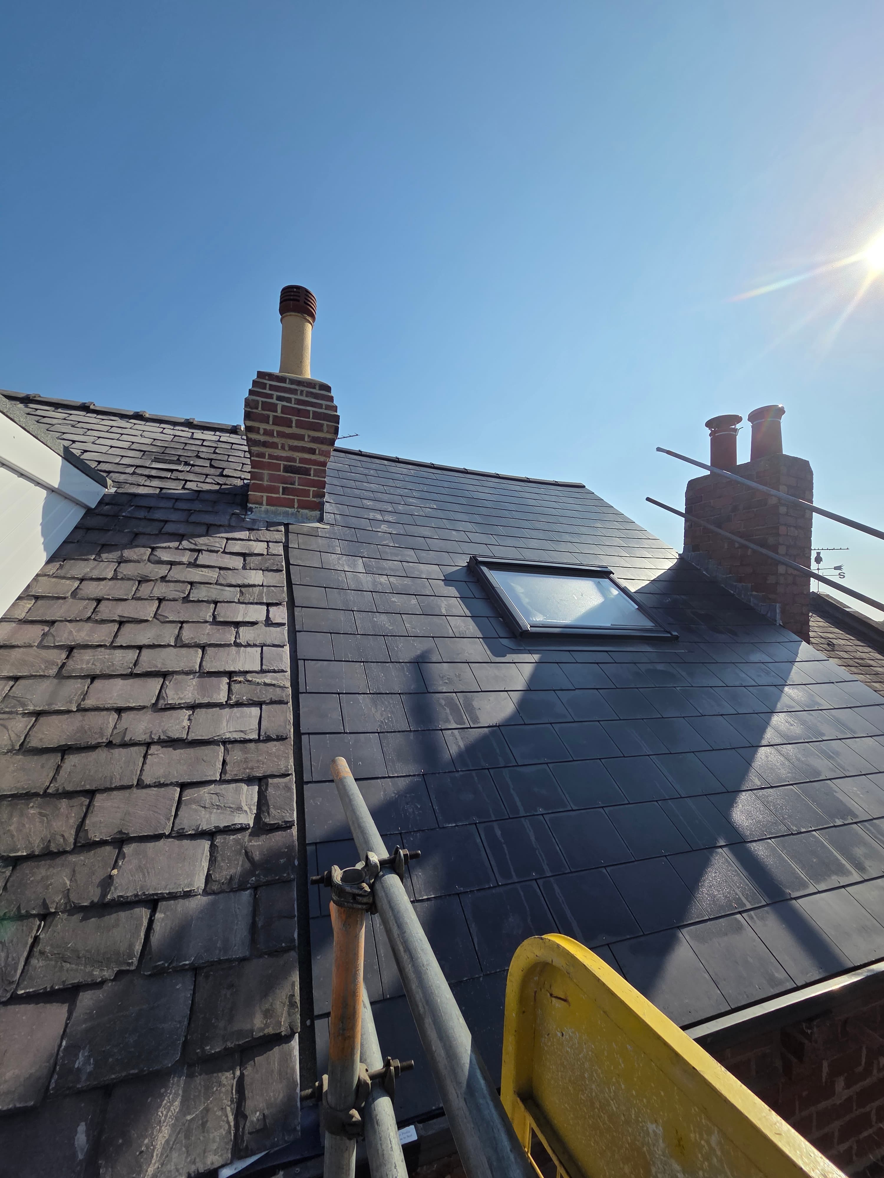 Fibre-cement slate strip and recover